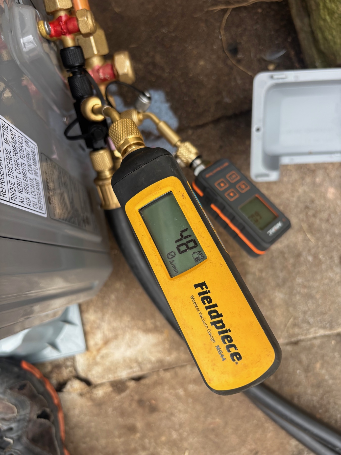 Measurement tools connected while evaluating geothermal heat pump performance.